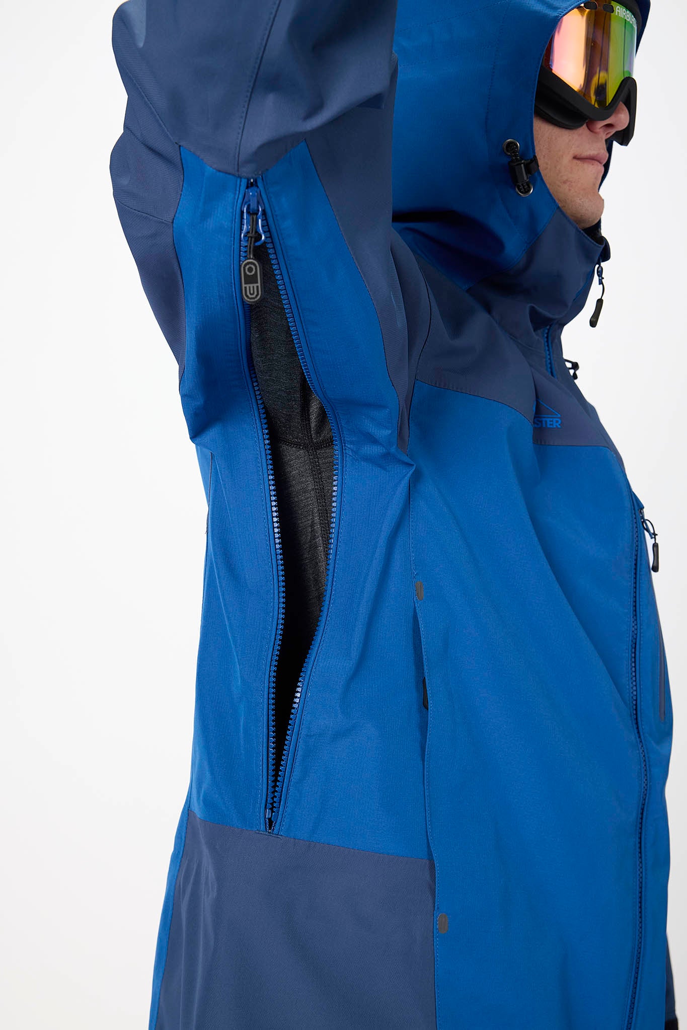 Person wearing a blue jacket with a hood on a white background
