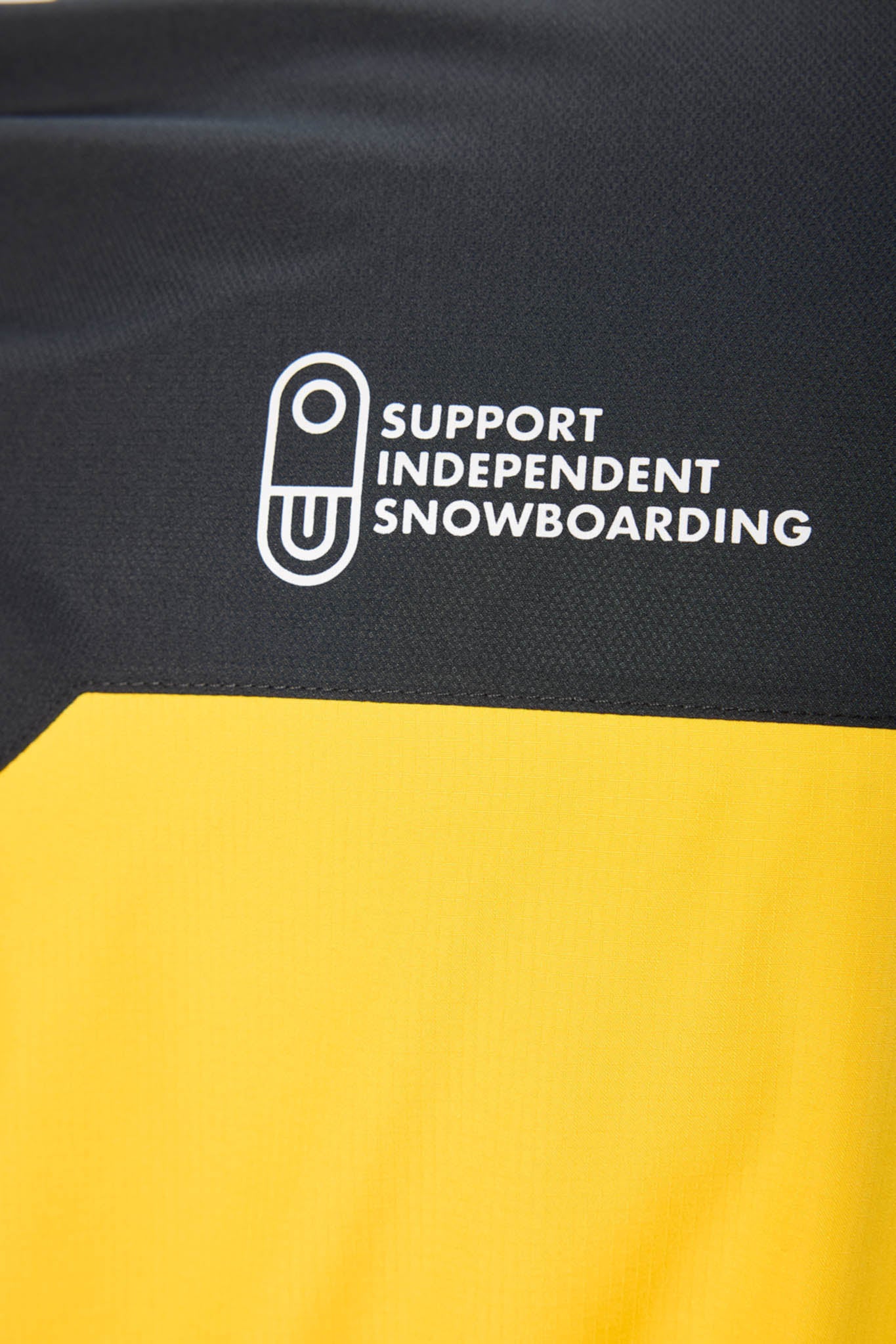 close up of yellow jacket and air blaster logo