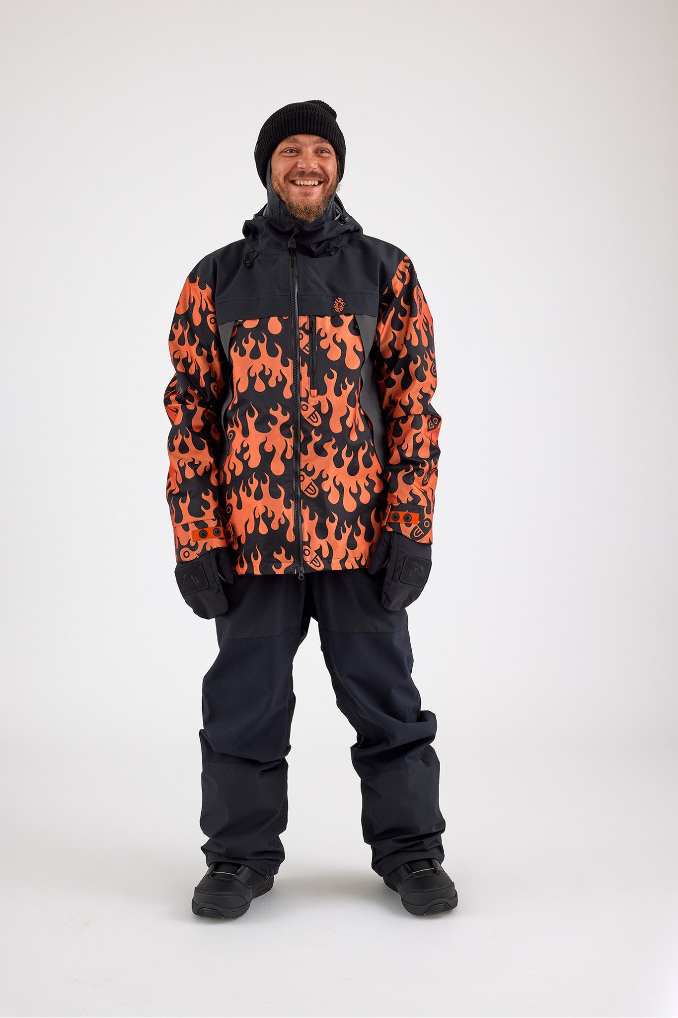 Man wearing snowboard jacket with flames design