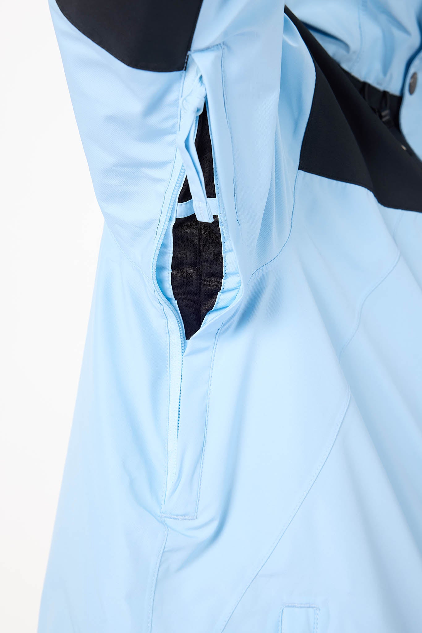 Light blue jacket with a black interior lining on a white background