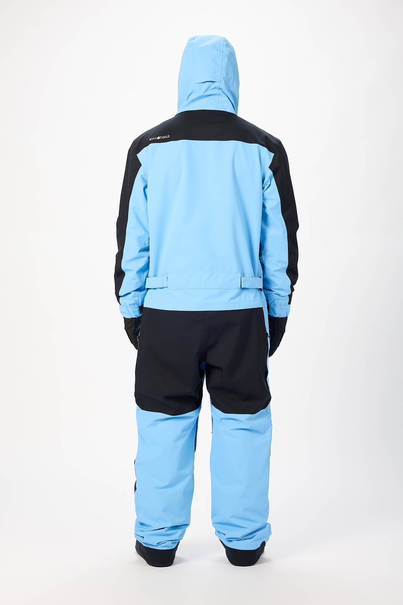 Blue and black snowsuit on a white background