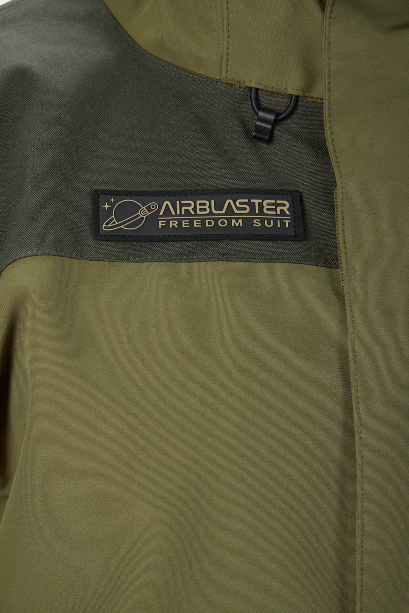 Green jacket with Airblaster Freedom Suit patch