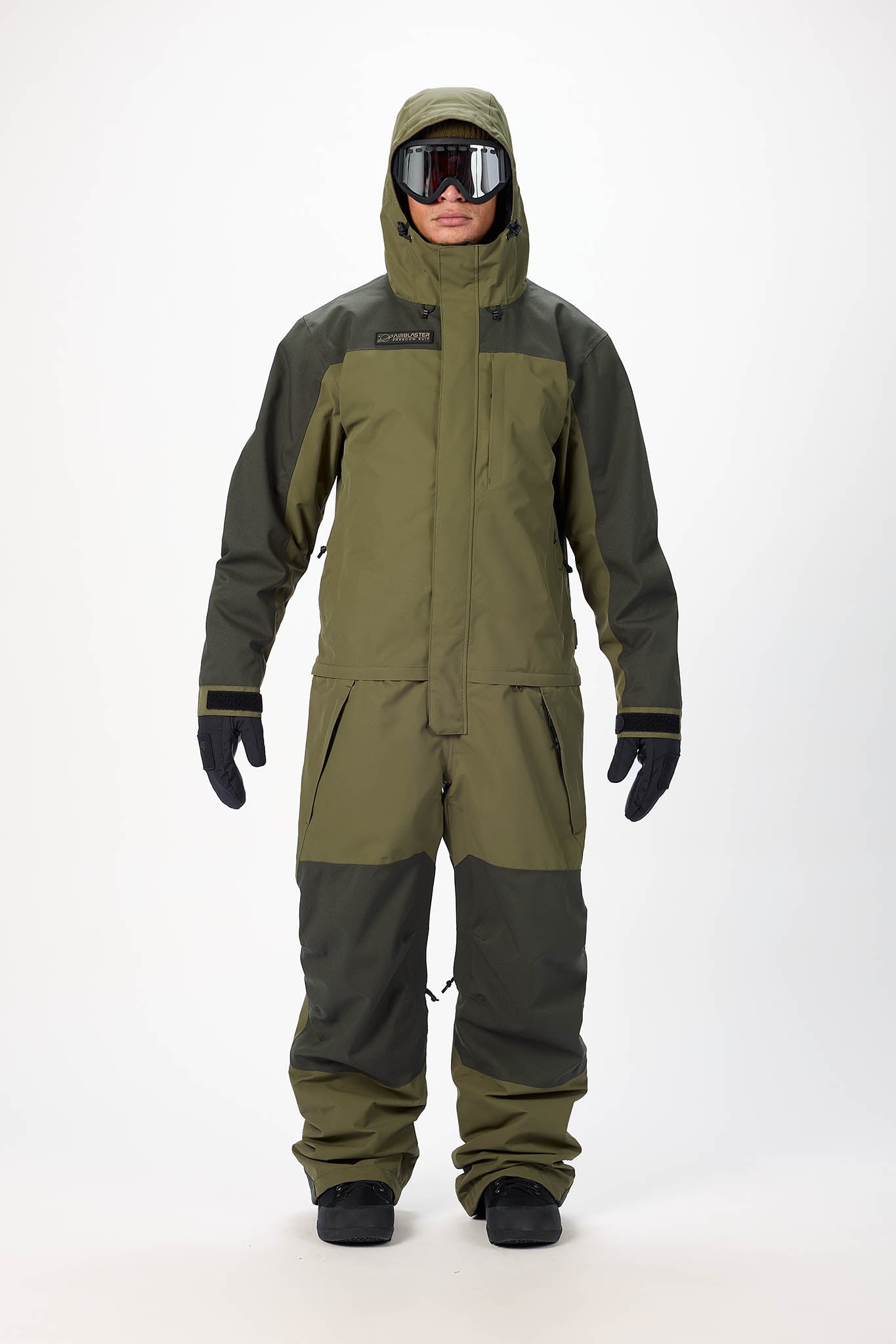 Person wearing a Green raincoat and pants on a white background