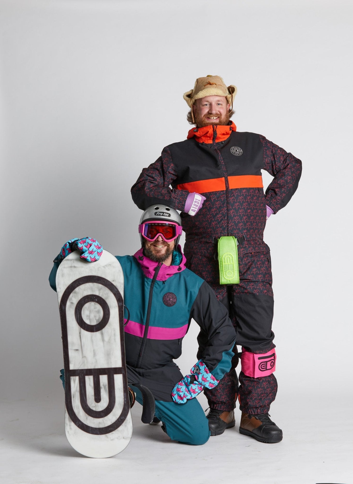 Model holding snowboard accessories