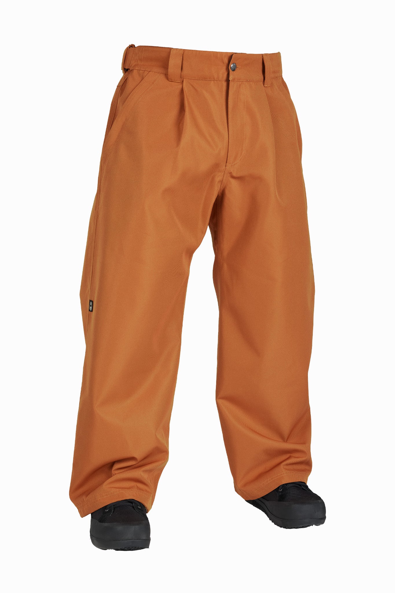 A pair of wide-leg orange snow pants shown on a headless mannequin or lower-body form, with black boots visible at the bottom, against a plain white background.