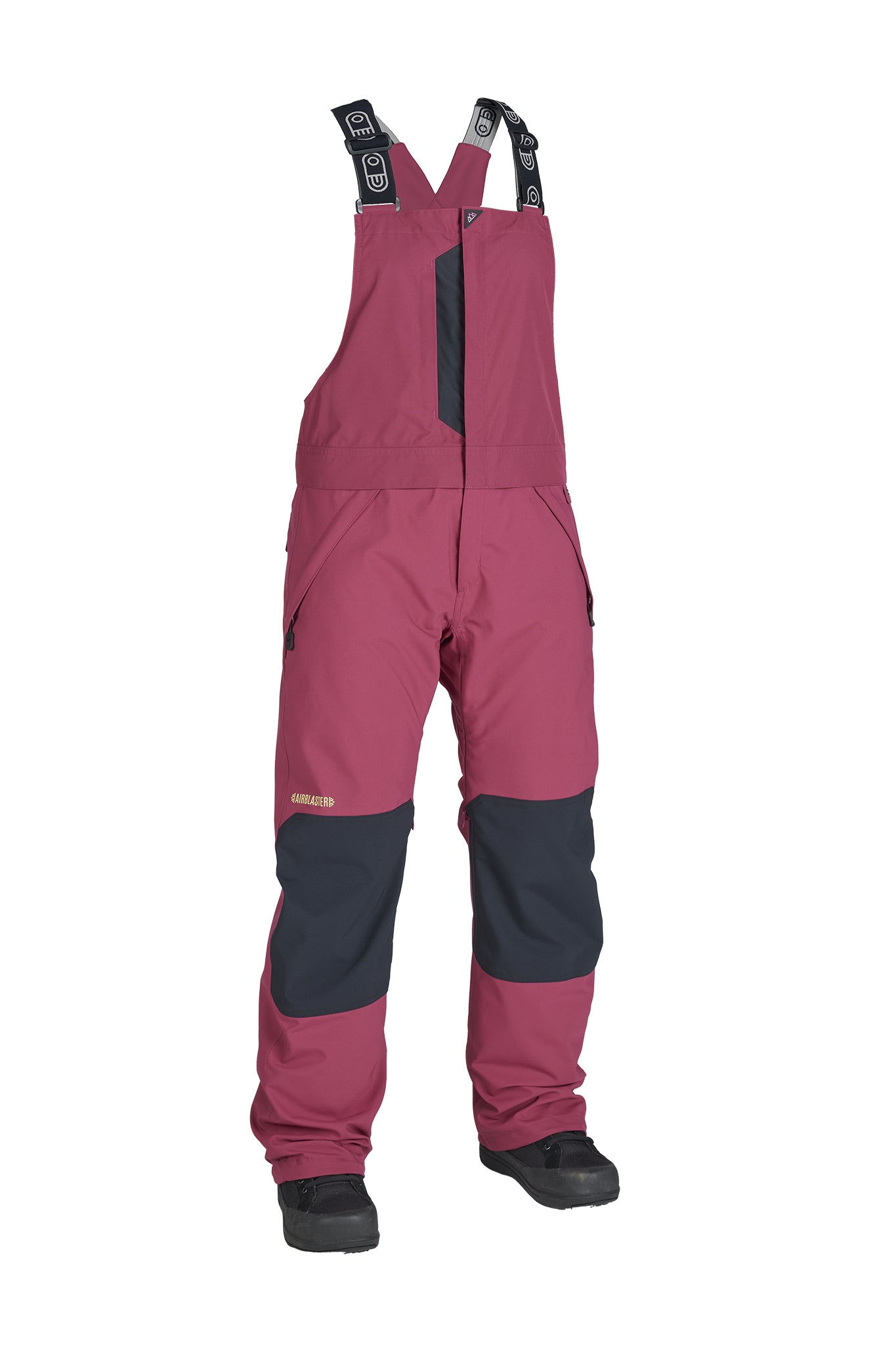 A pair of ski bib pants in a dusty rose pink color with dark gray knee patches and black suspenders, shown on a white background.