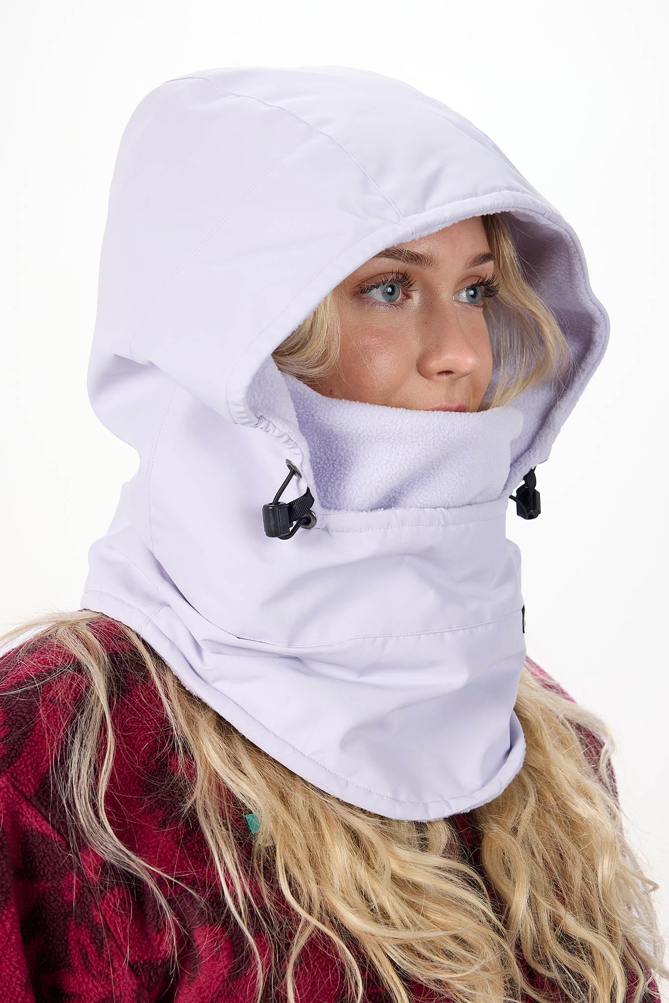 Person wearing a light purple hooded balaclava on a white background