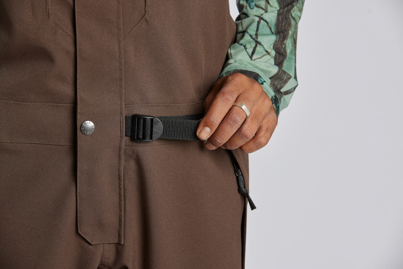 hand pulling waist band