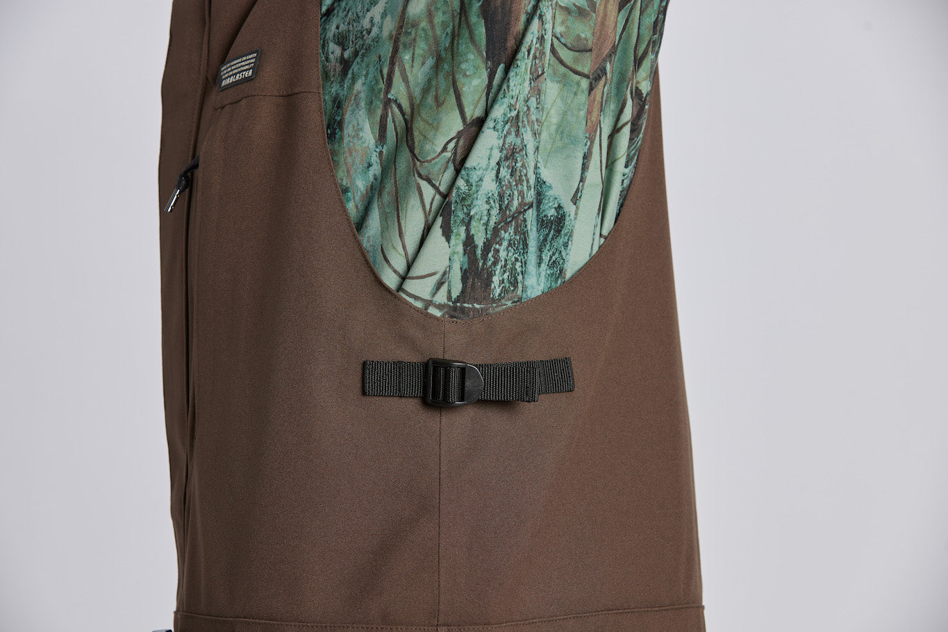 side of bib with adjustable strable