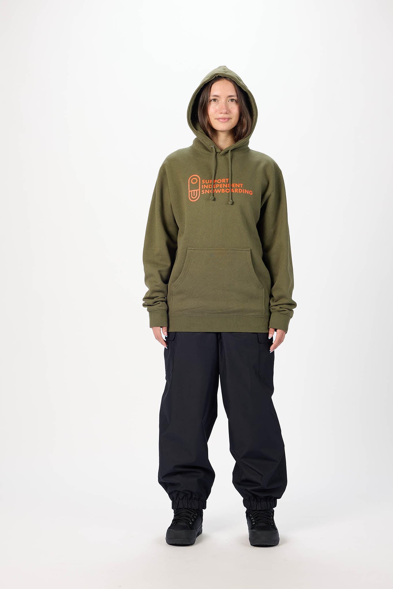 Model wearing olive hoodie with orange text
