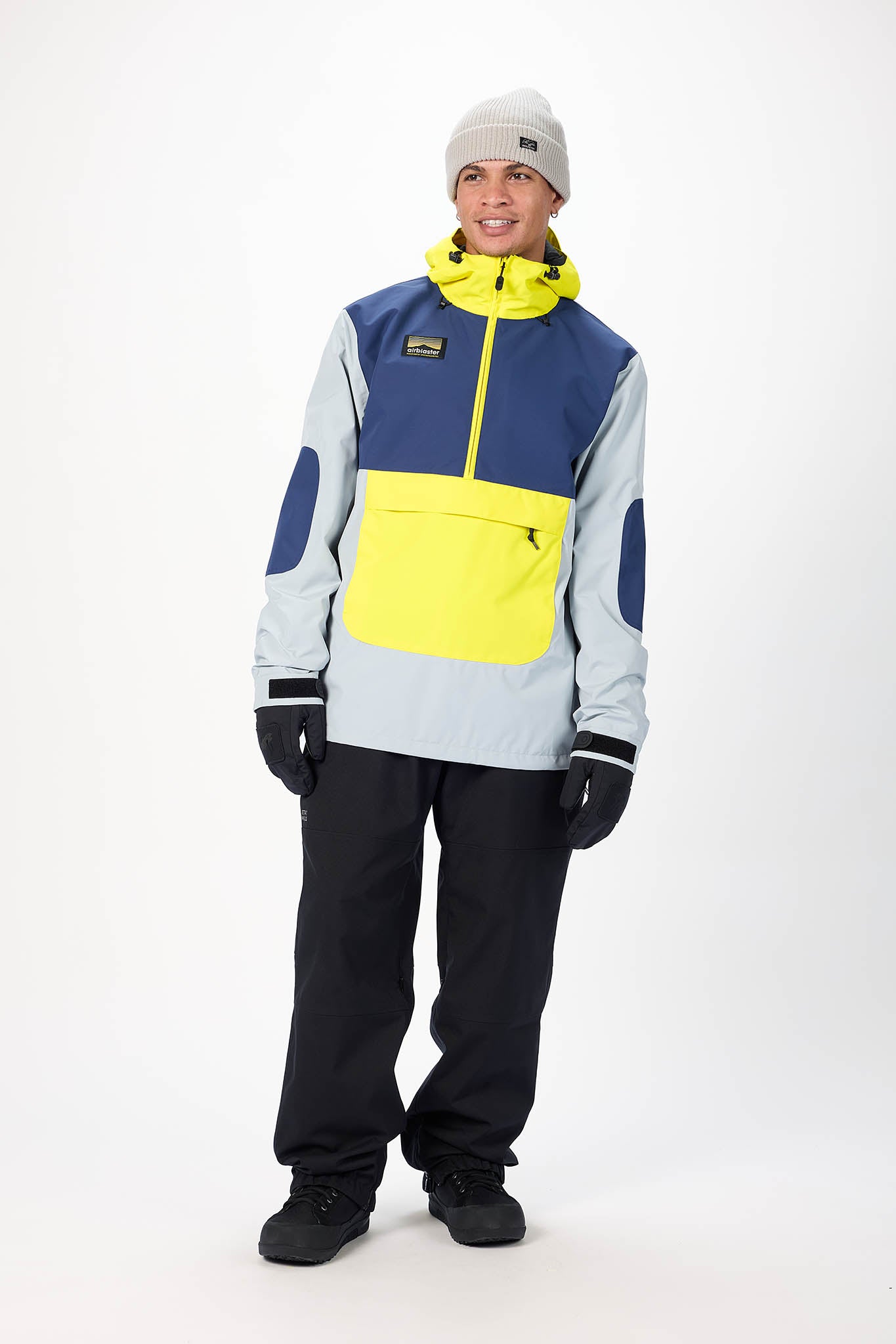 Person wearing a colorful jacket with a white background