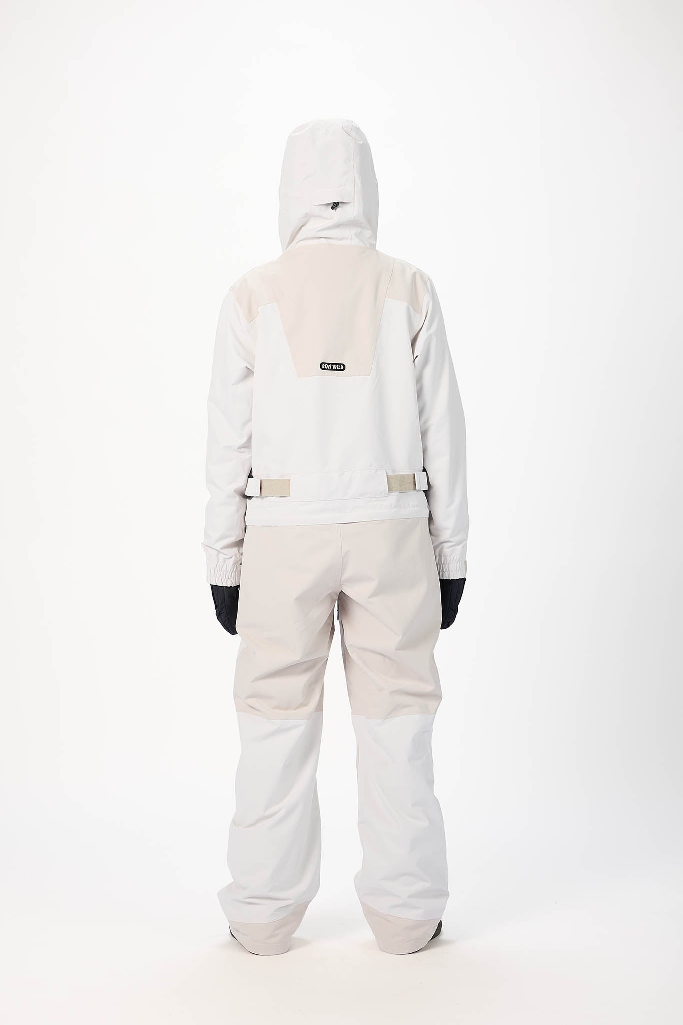 White snowsuit with a hood on a white background
