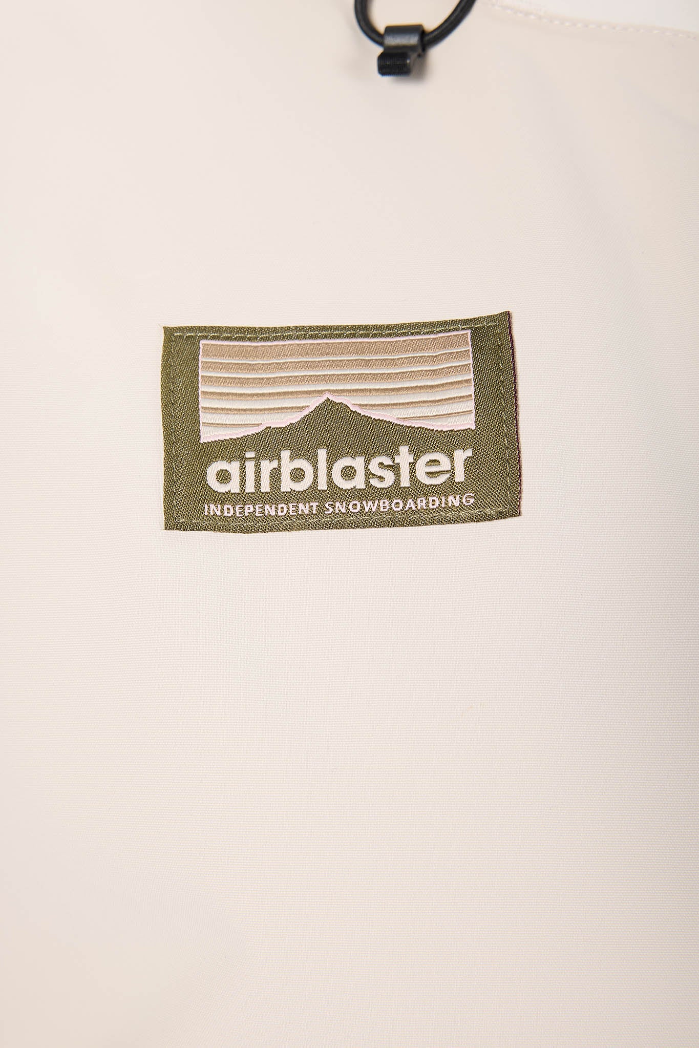 Airblaster logo on a snowboard jacket