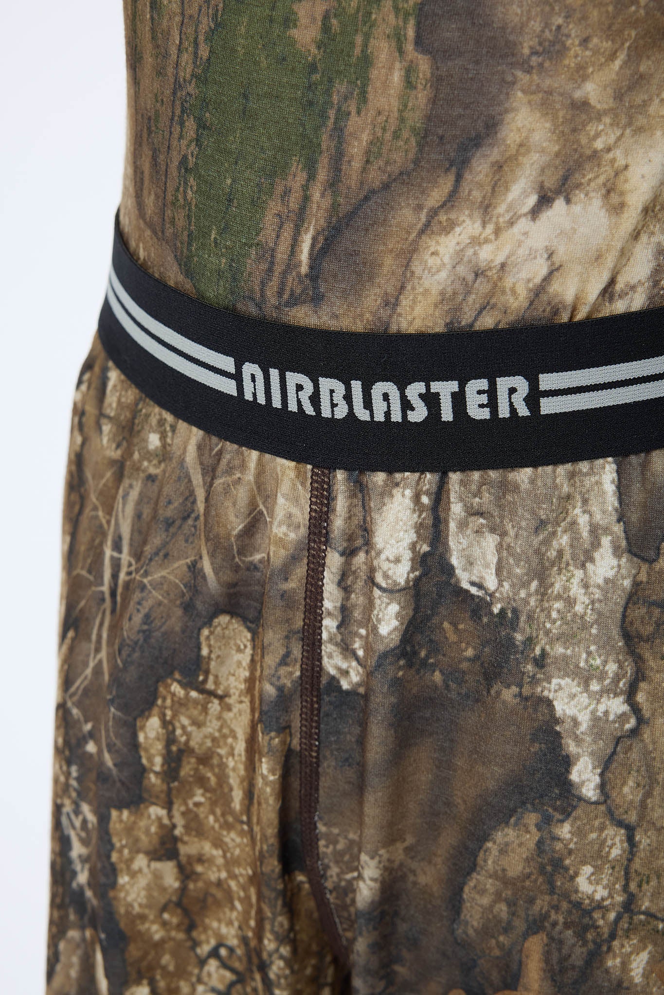 Close up of base layer product showing stitching details of the RealTree Camouflage pattern