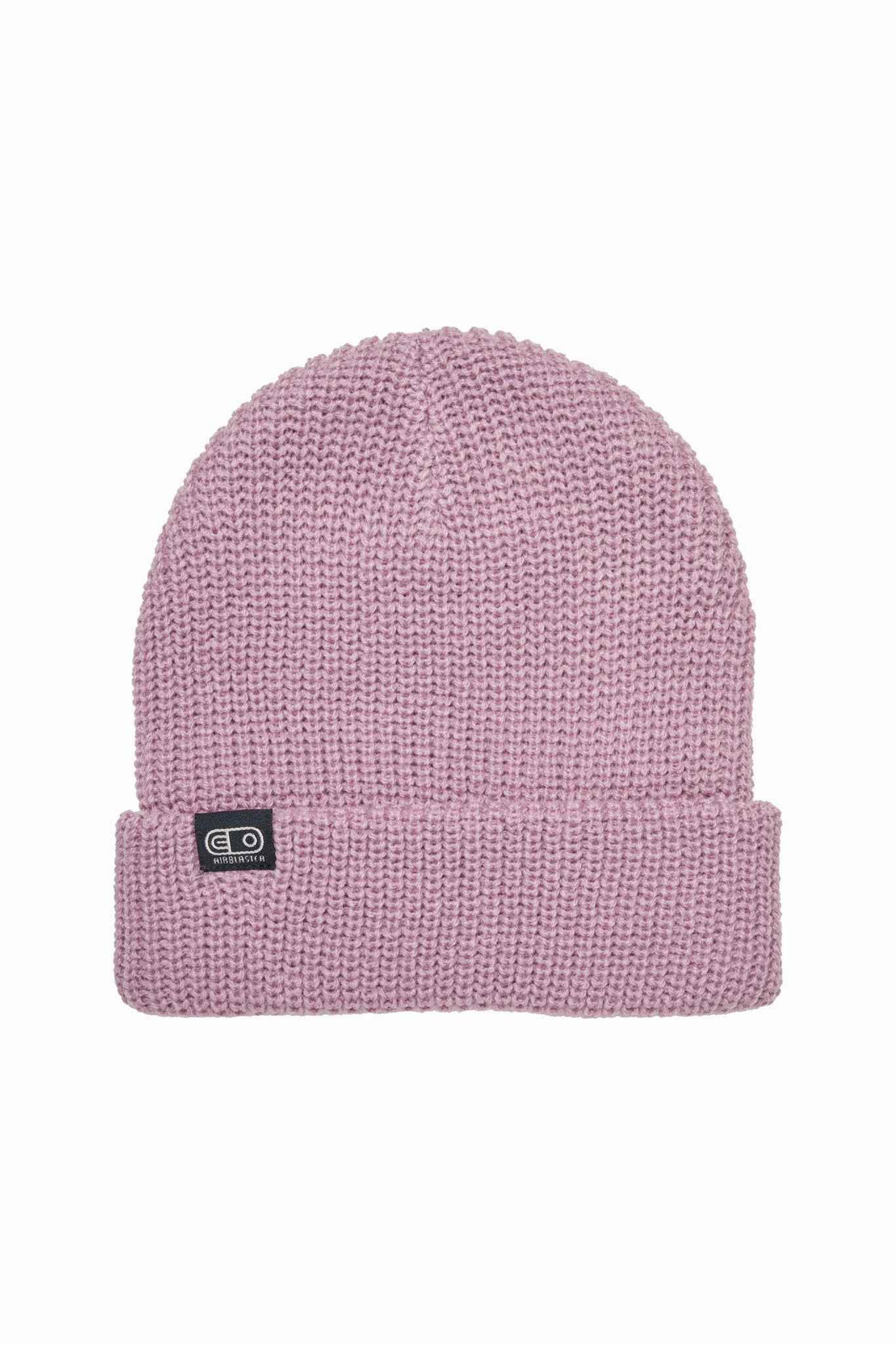 A light pink ribbed knit beanie hat with a folded cuff and a small black brand patch on the front, shown against a plain white background.