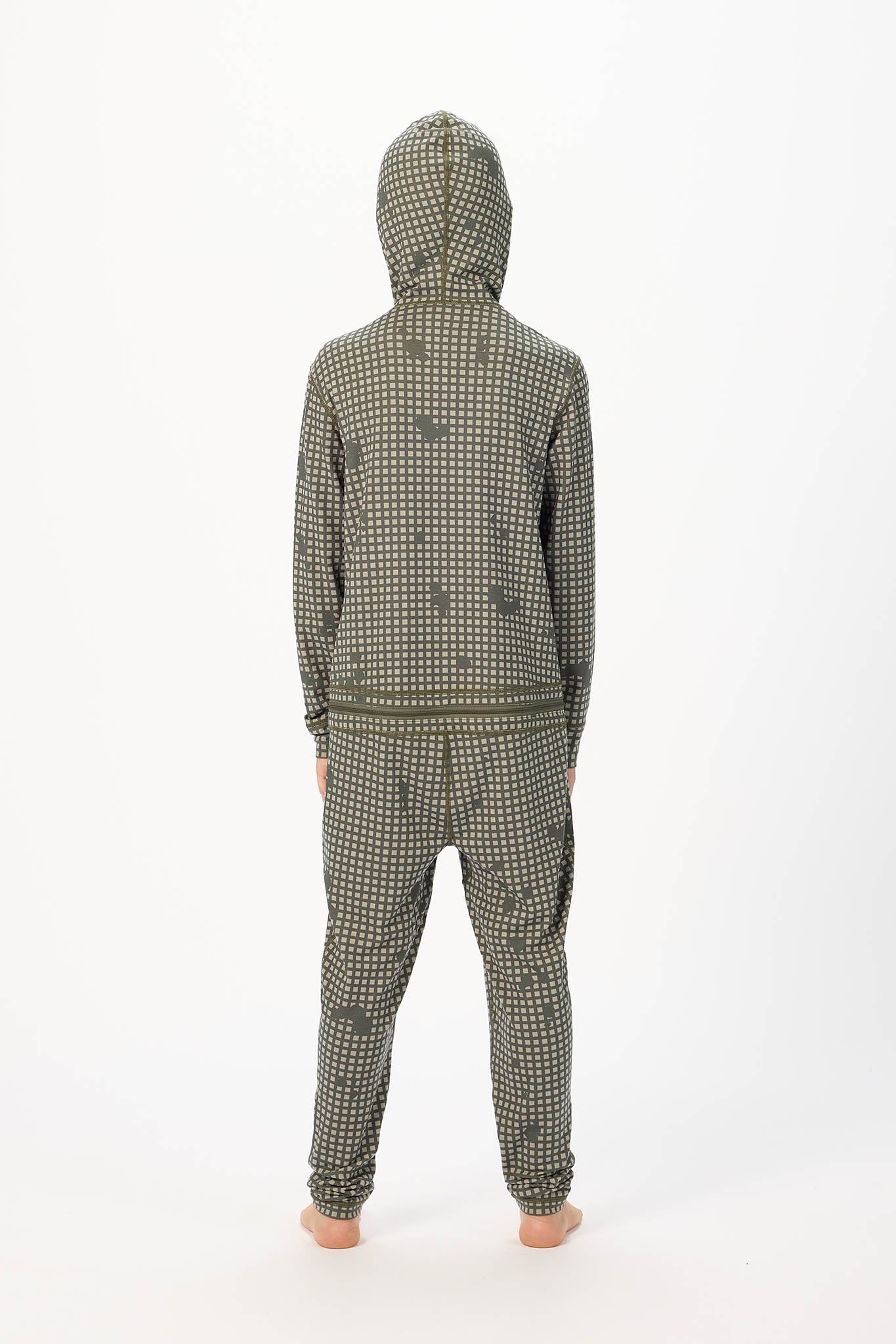 A person viewed from the back wearing a matching hooded sweatshirt and jogger pants set in an olive green and white micro-check pattern, standing against a plain white studio background.