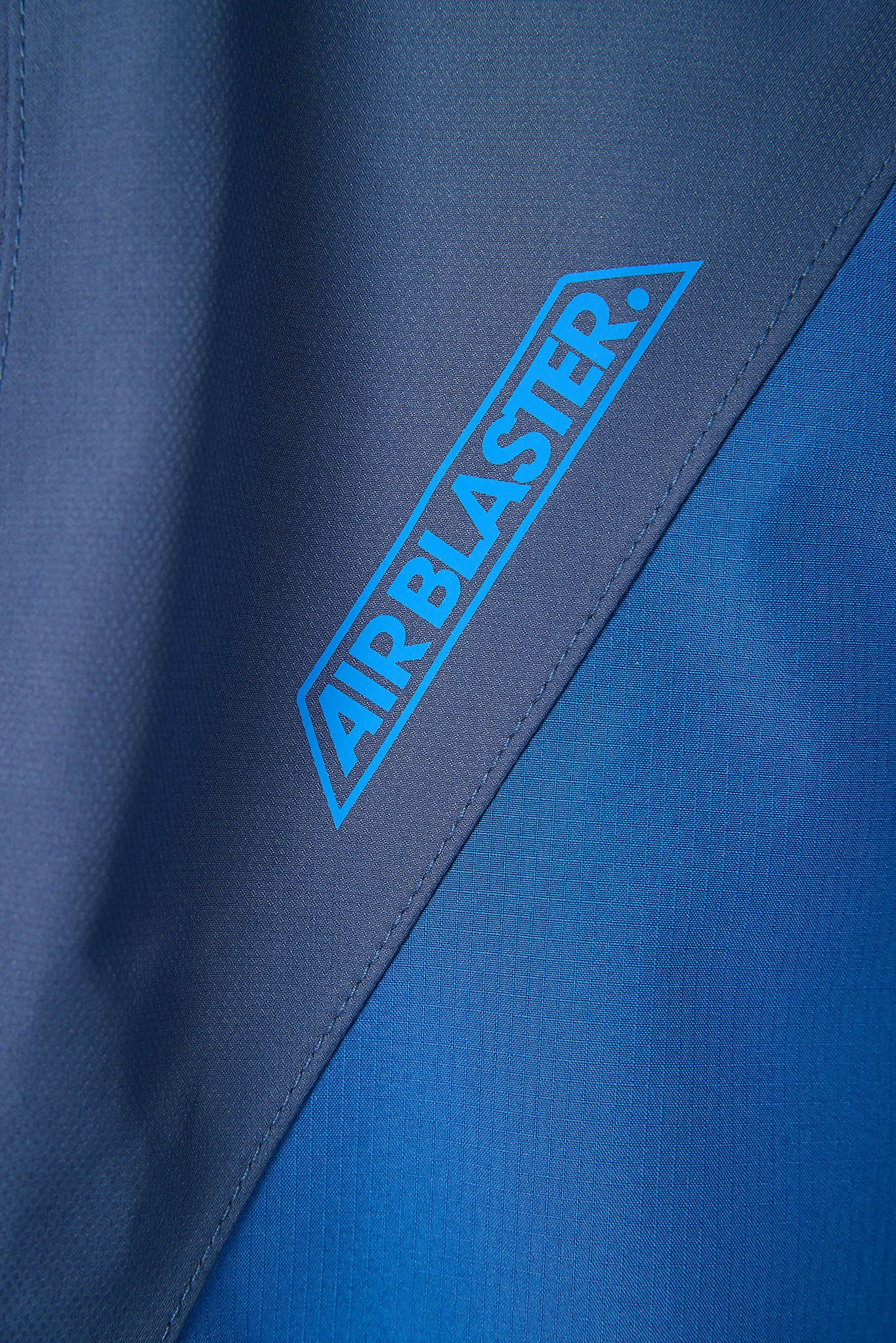Blue fabric with 'AIRBLASTER' logo