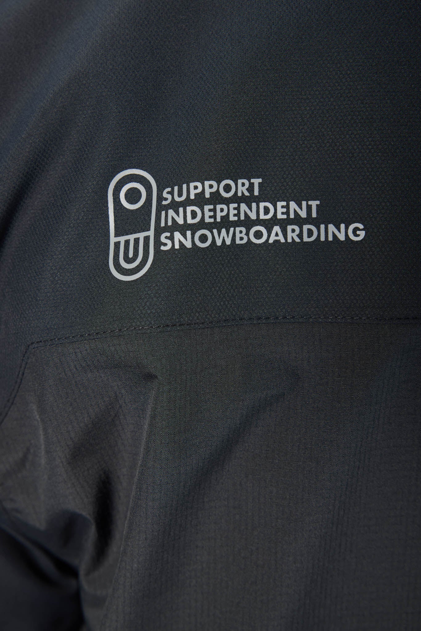 close up of black jacket with logo
