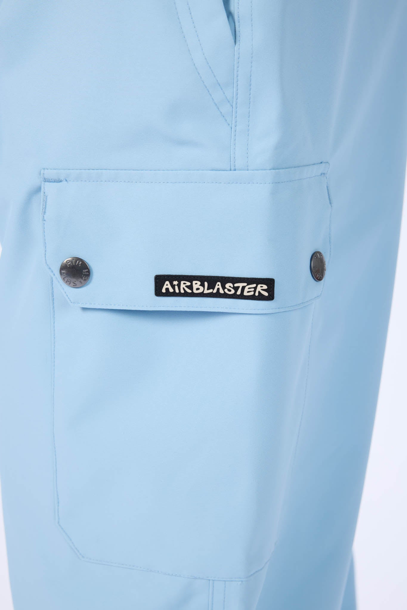 Light blue pants with a visible brand label on a white background