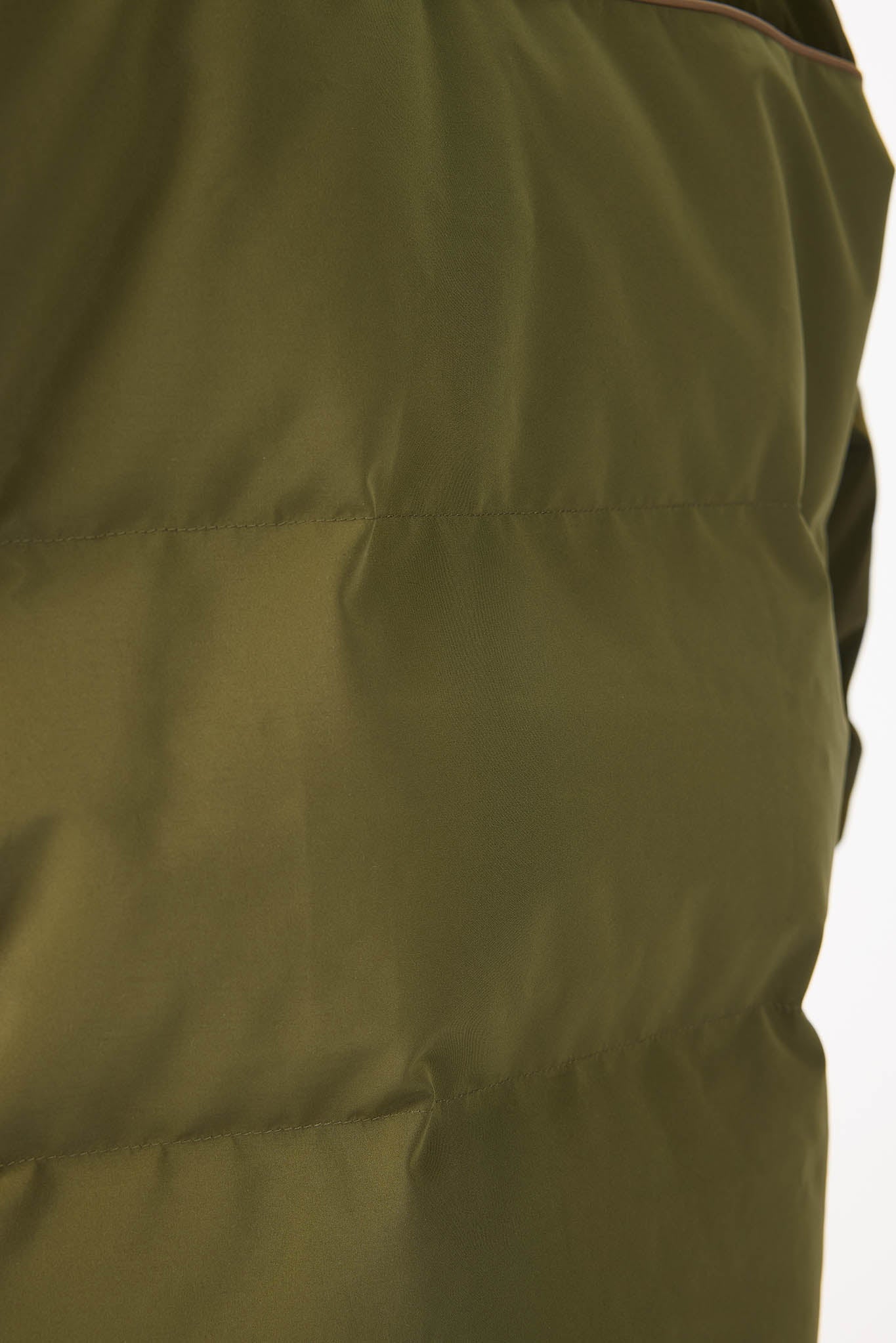 Close-up of a green jacket with a hood on a white background