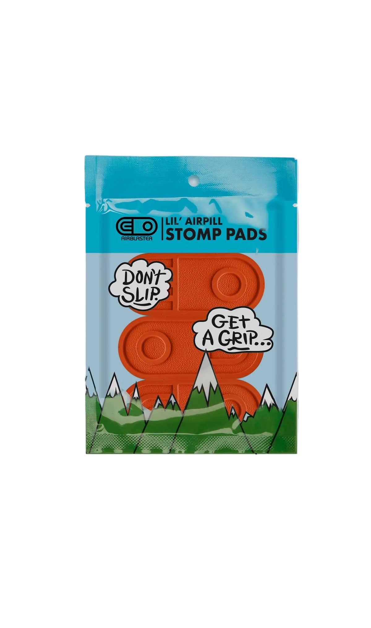 A package of Lil' Airpill Stomp Pads by air blaster, featuring two orange airpill pads with cartoon-style graphics of mountains and speech bubbles on a light gray background.