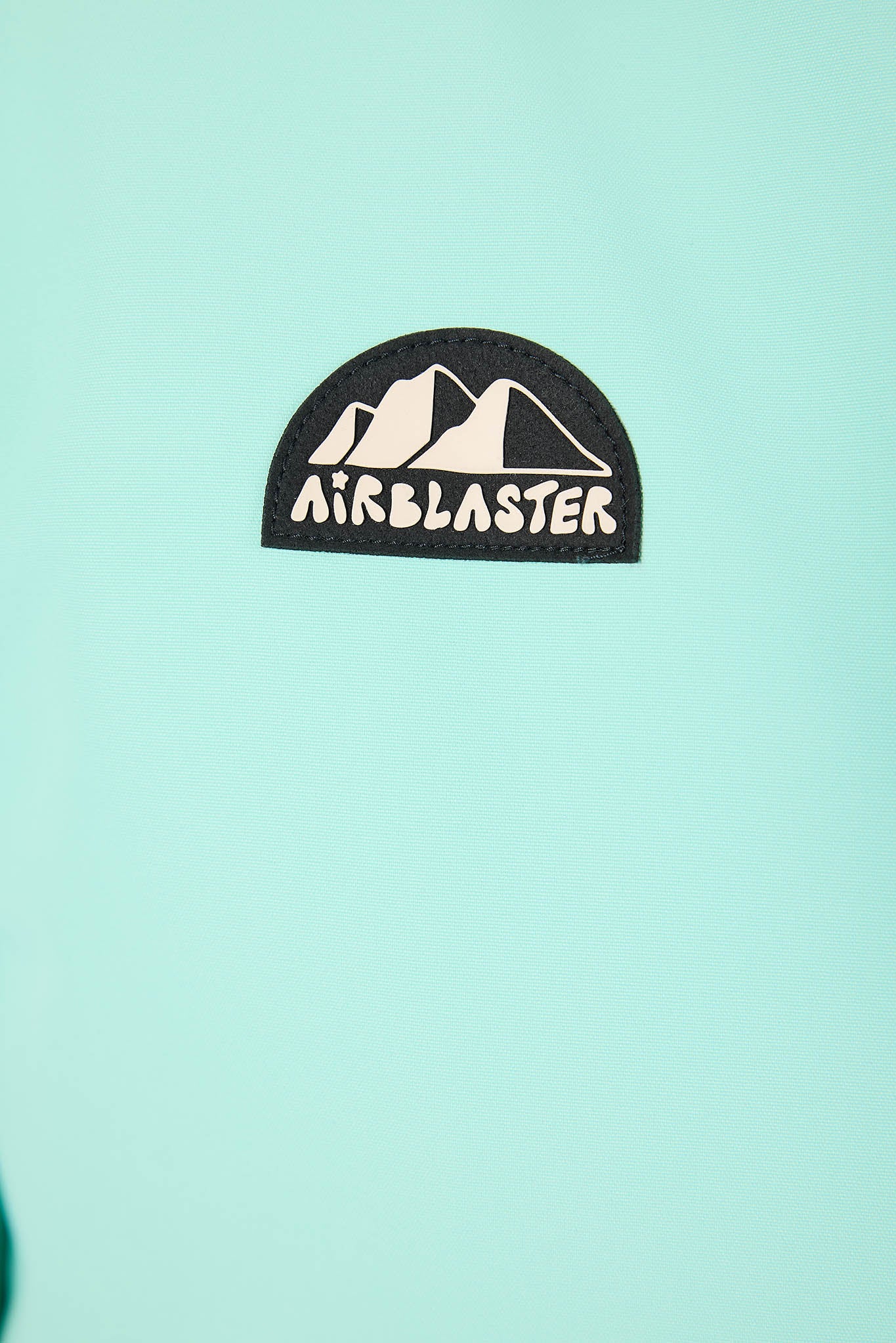 Airblaster logo on a light blue background