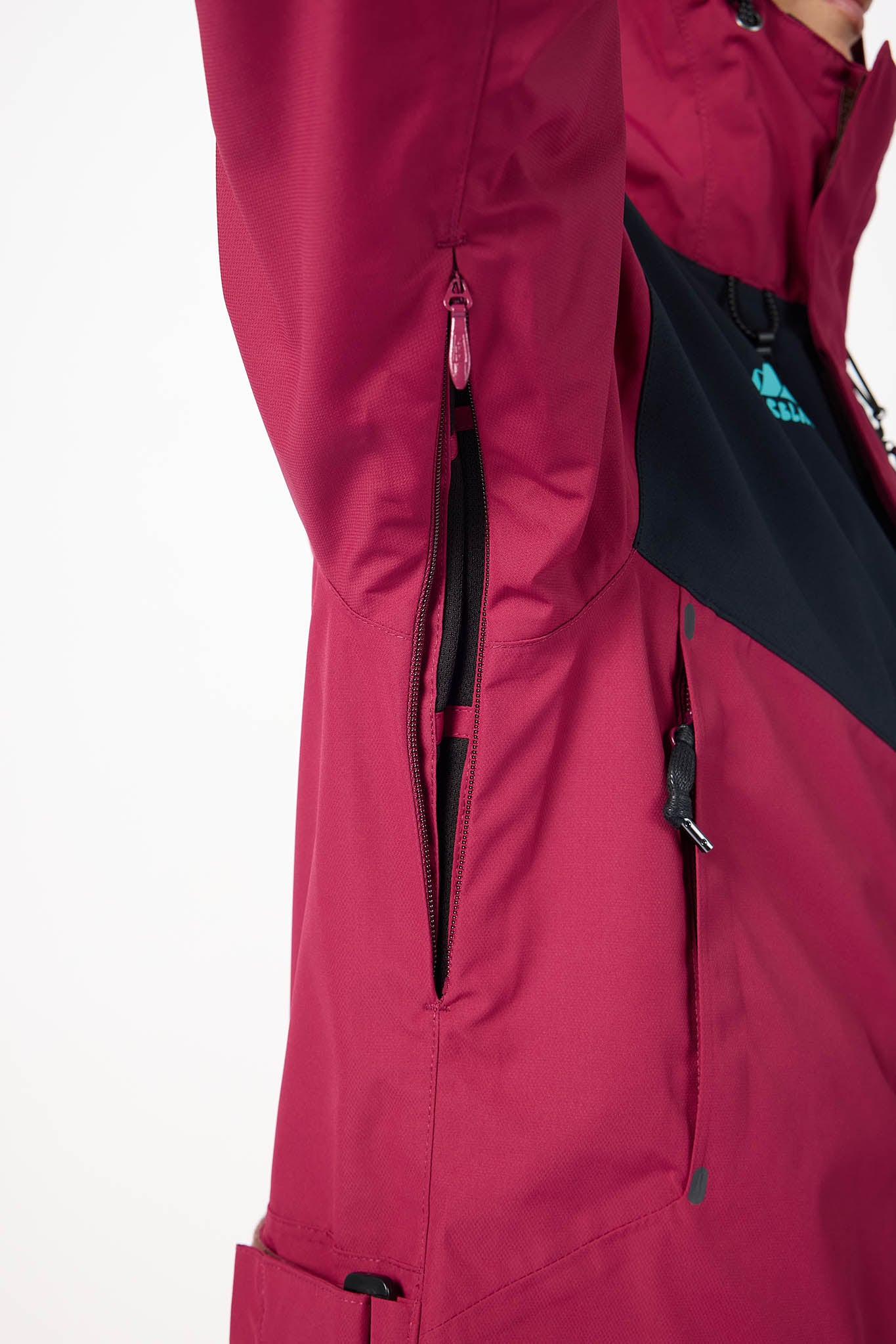 Close-up of a red jacket with black accents on a white background