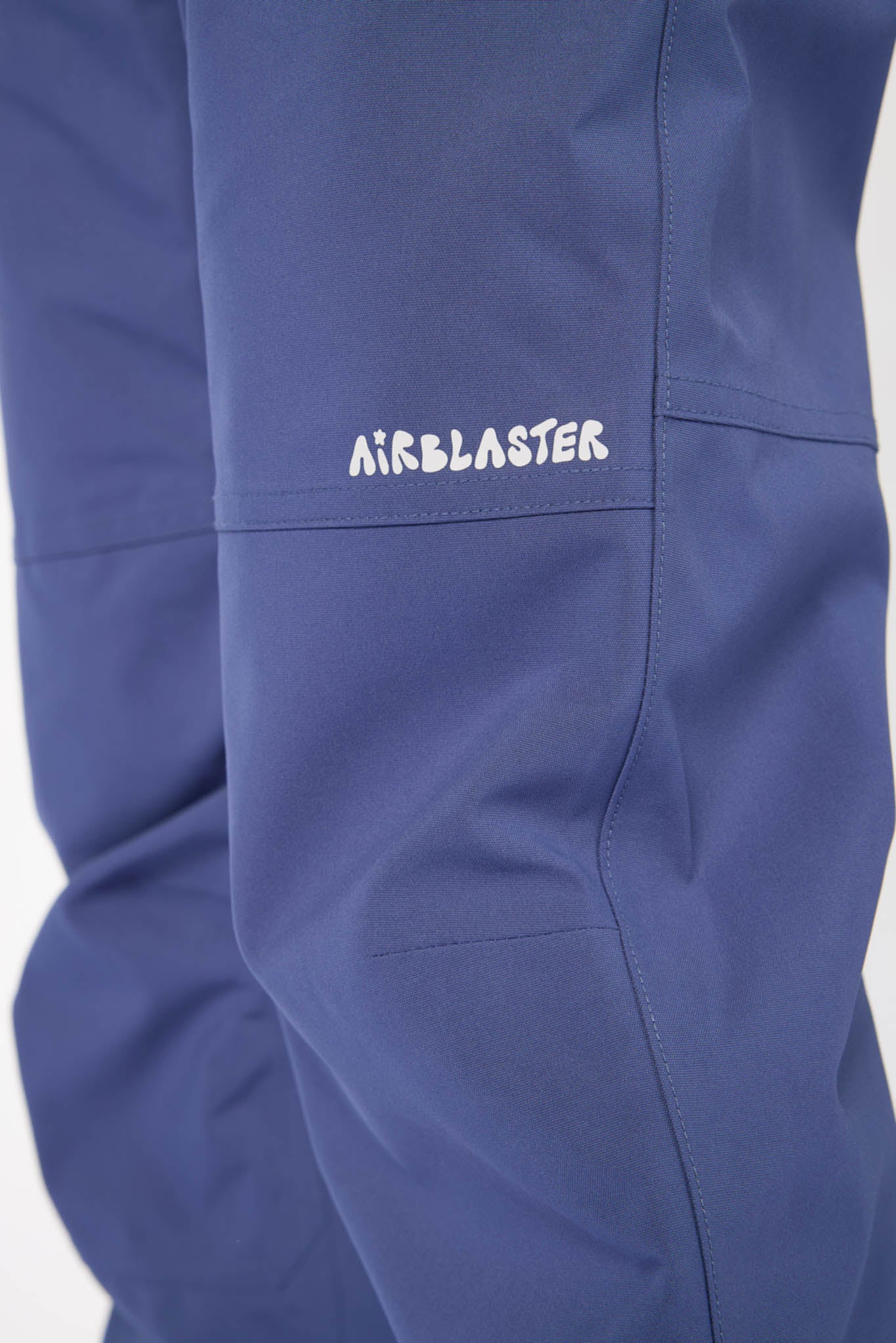 Blue jacket with 'Airblaster' logo on a white background