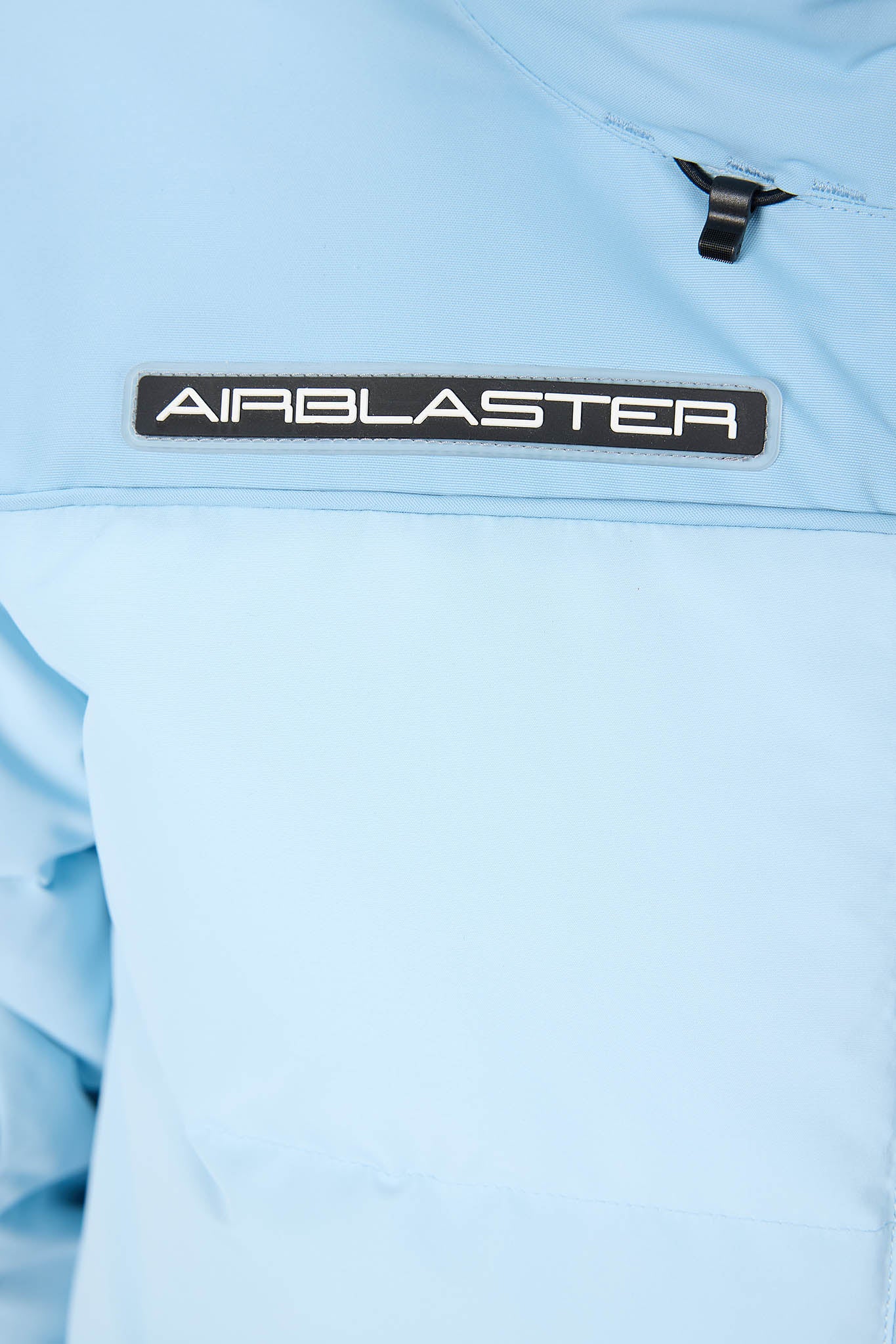 Light blue jacket with 'AIRBLASTER' logo on a white background
