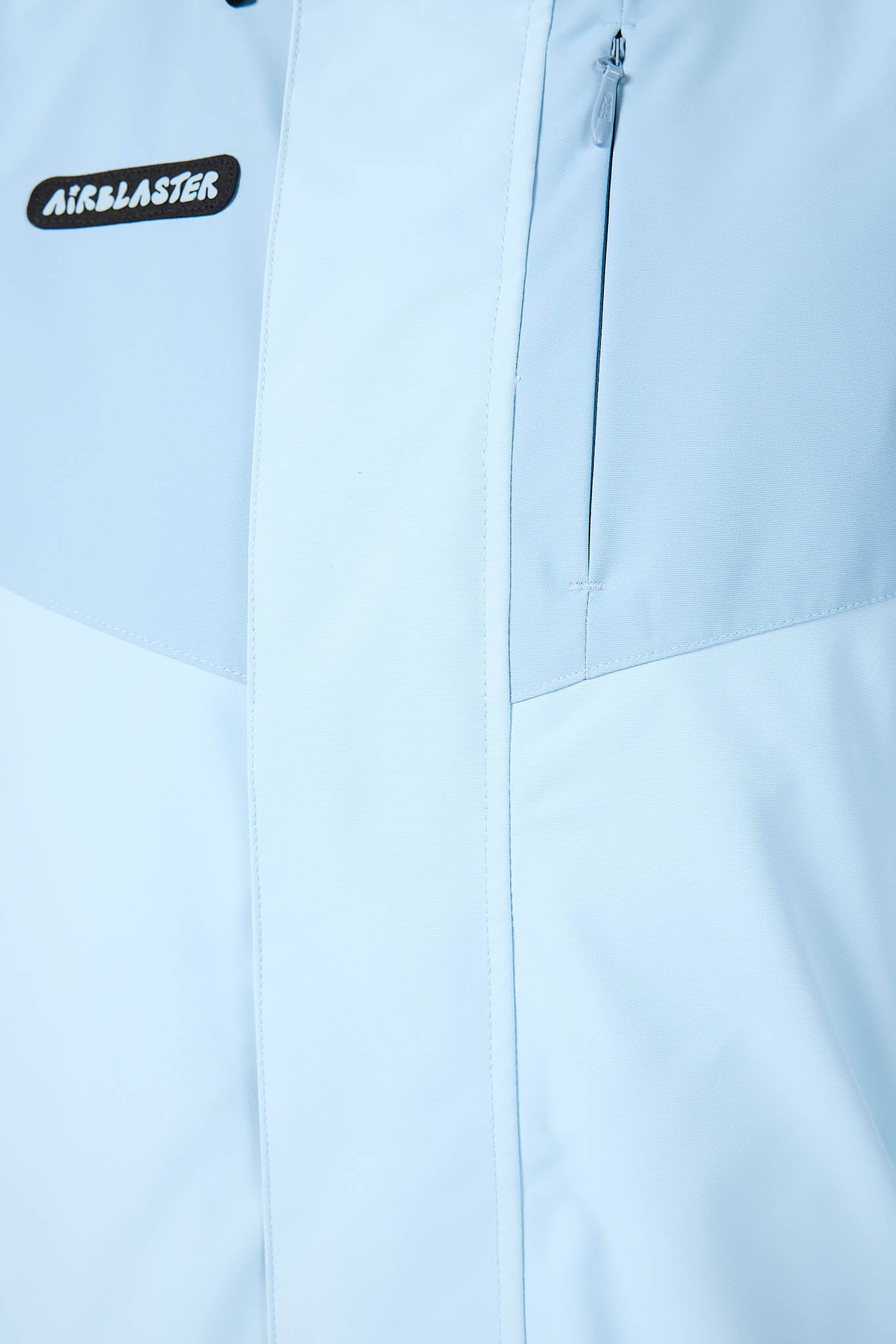 Light blue jacket with a visible brand logo on a white background