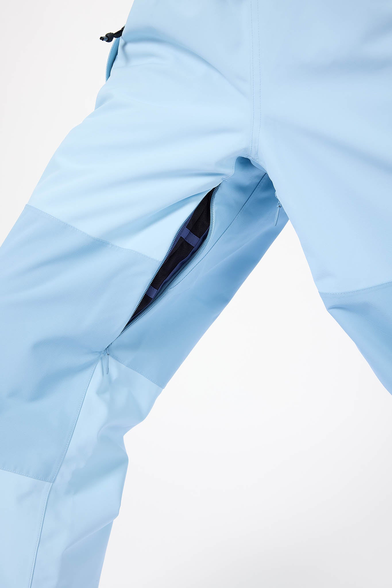 Light blue pants with a pocket on a white background
