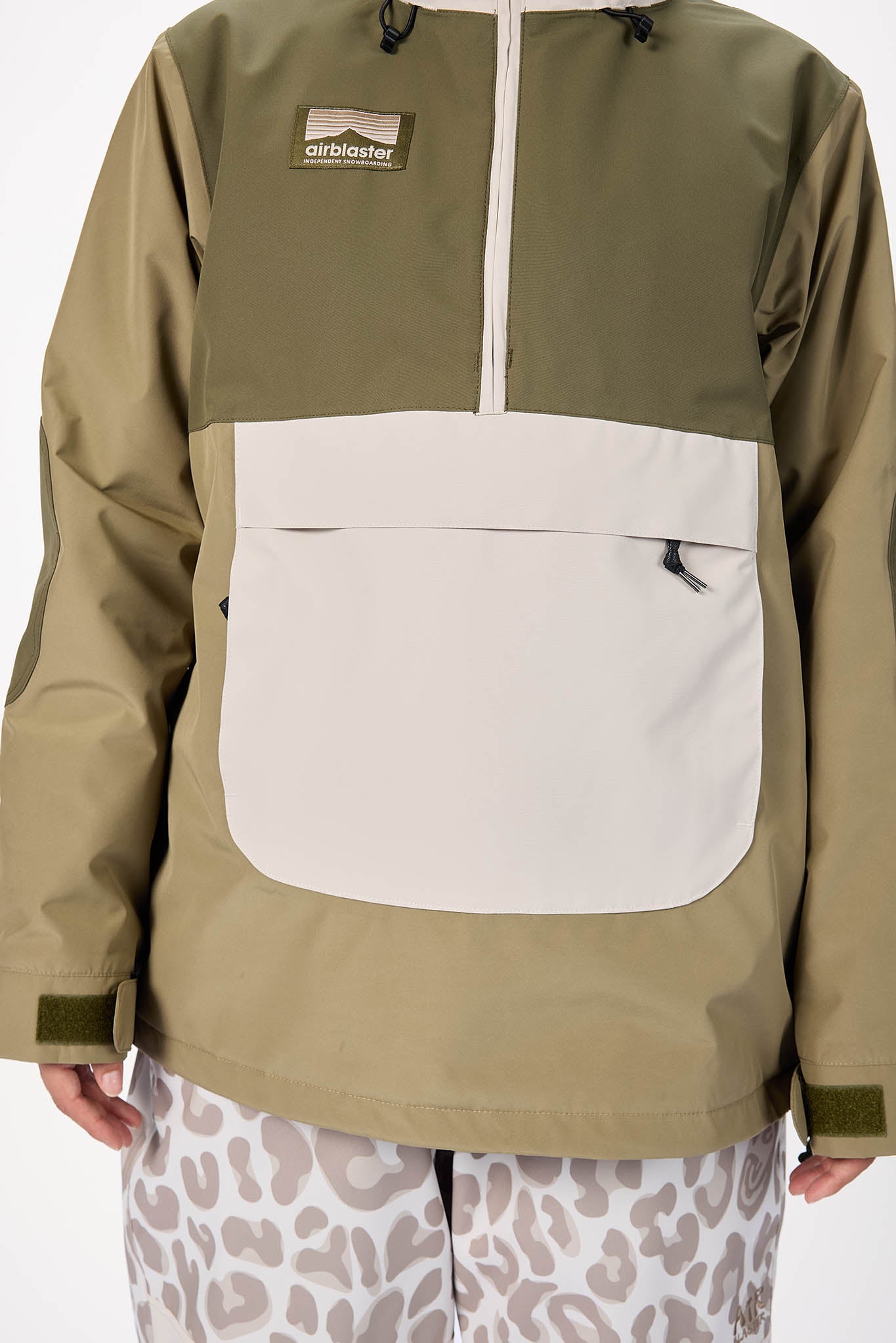 Green and beige jacket with a brand logo on a white background