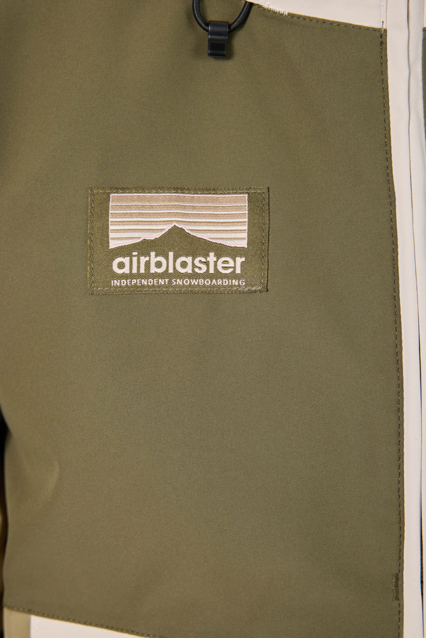 Green jacket with Airblaster logo on a white background