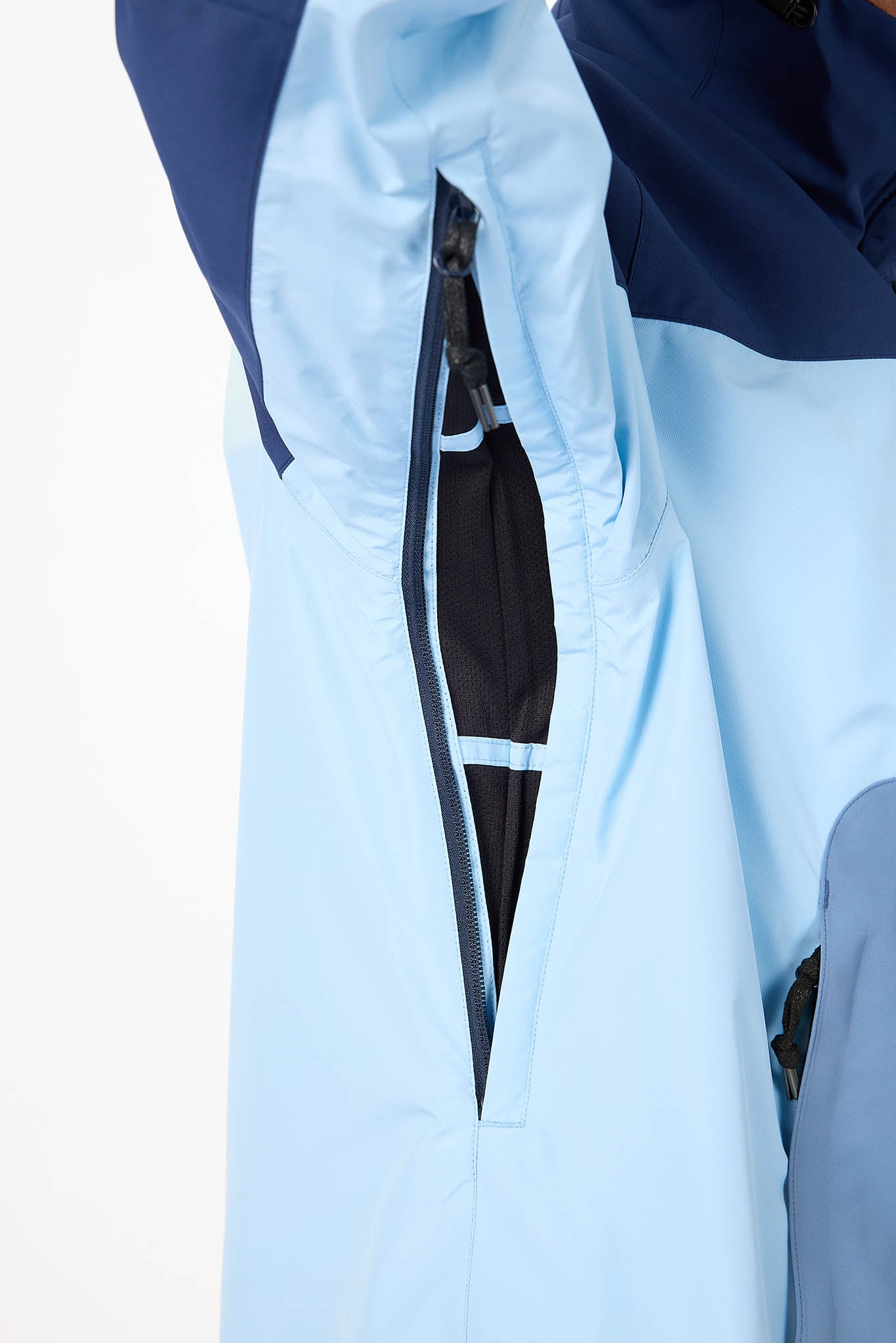 Close-up of a light blue jacket with a zipper on a white background