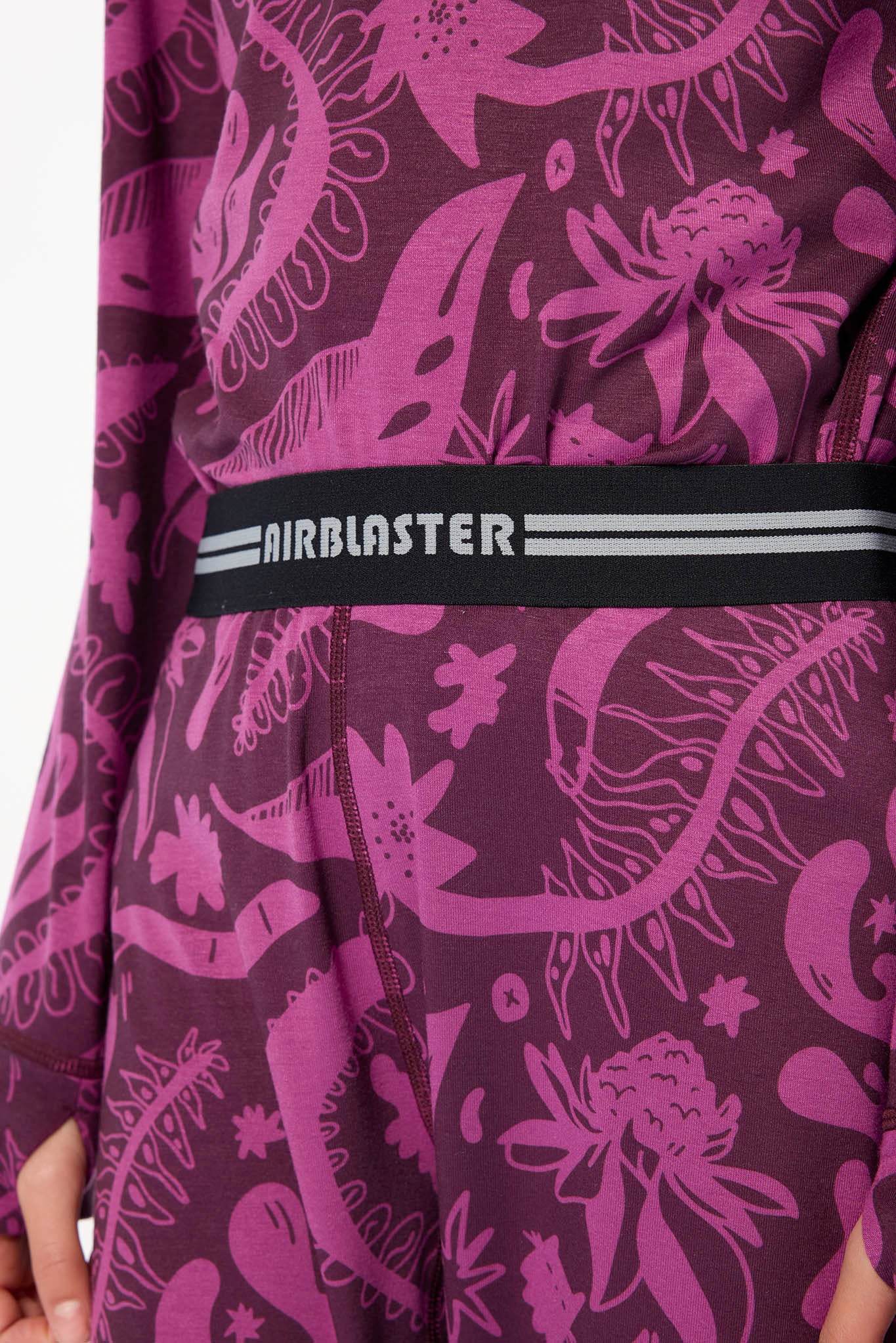 Close up of base layer product showing stitching details of the Plum Earth life pattern